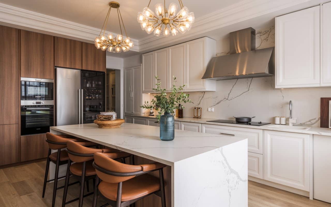 Luxury kitchen island with marble countertop, built-in appliances, designer lighting, modern high-end kitchen, Pinterest style.