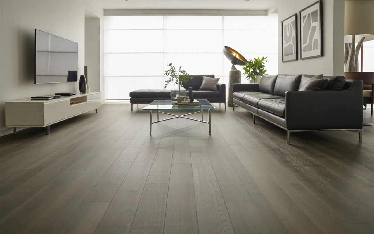 Contemporary living room with grey vinyl flooring and modern furniture.