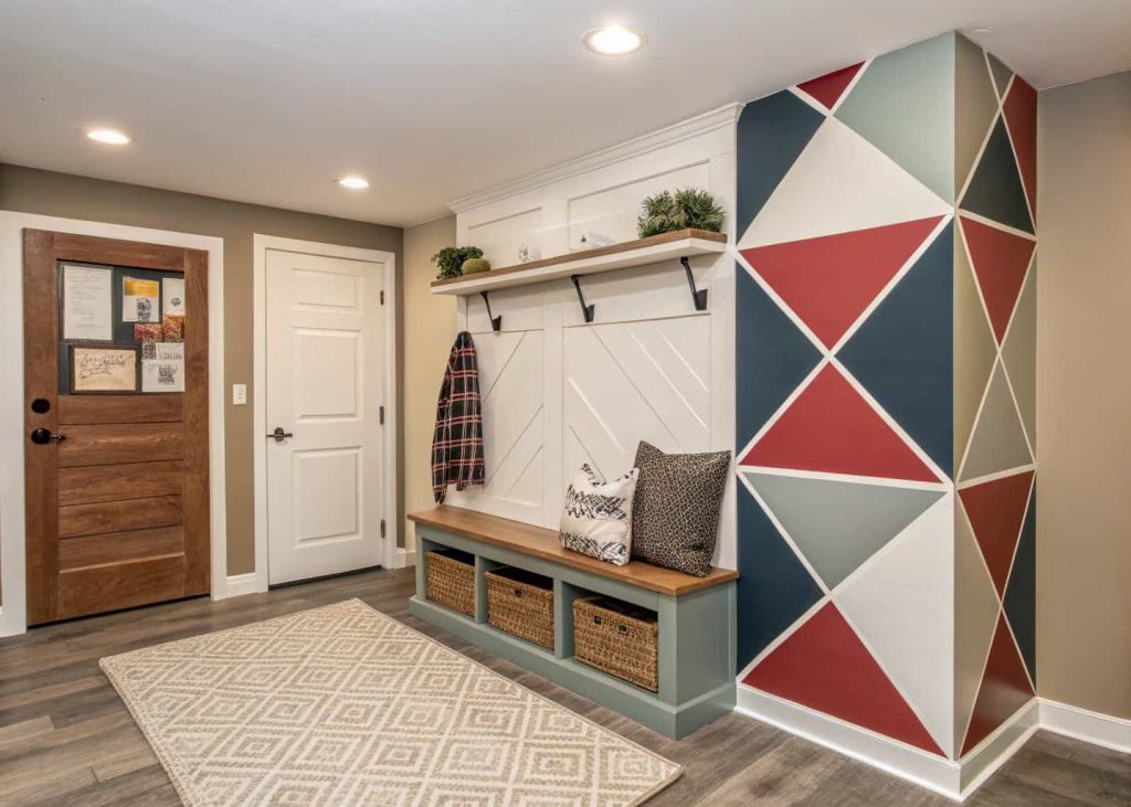 Small home entrance decor DIY accent wall, geometric pattern, neutral and bold tones, compact stylish entryway