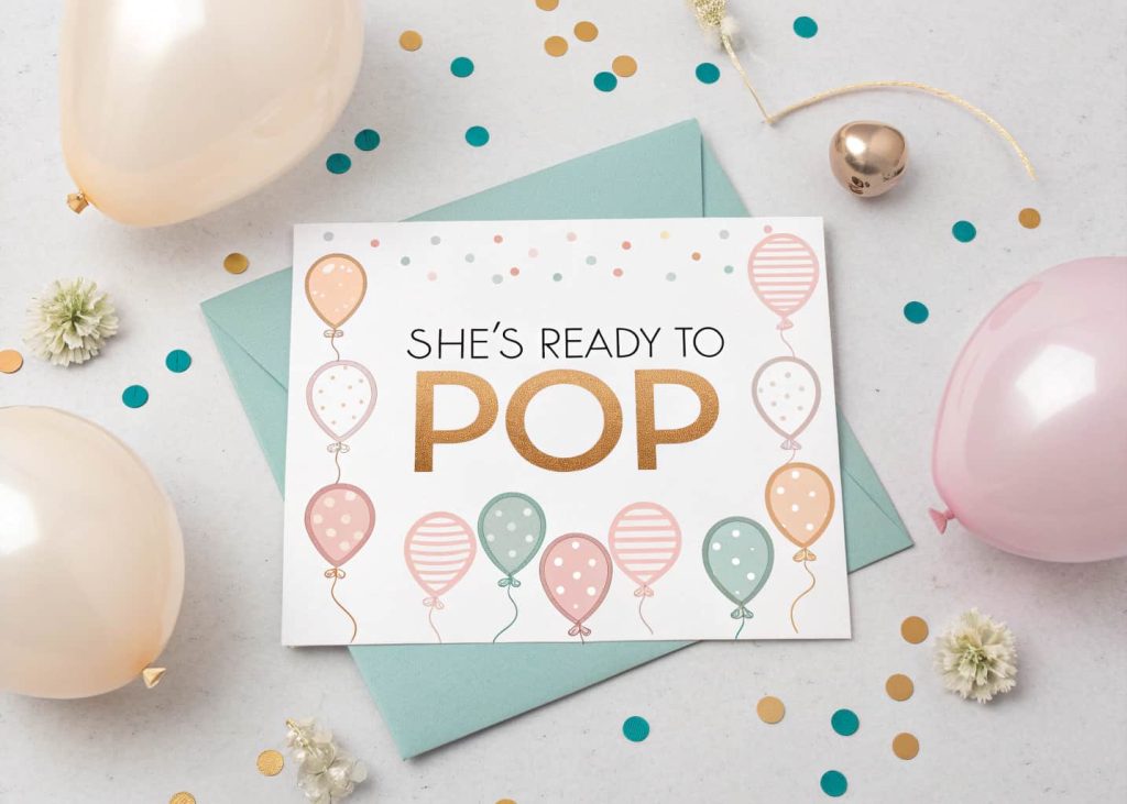 Baby shower invitation card, pastel colors, balloons and confetti design, ‘She’s Ready to Pop’ theme, elegant flat lay.”