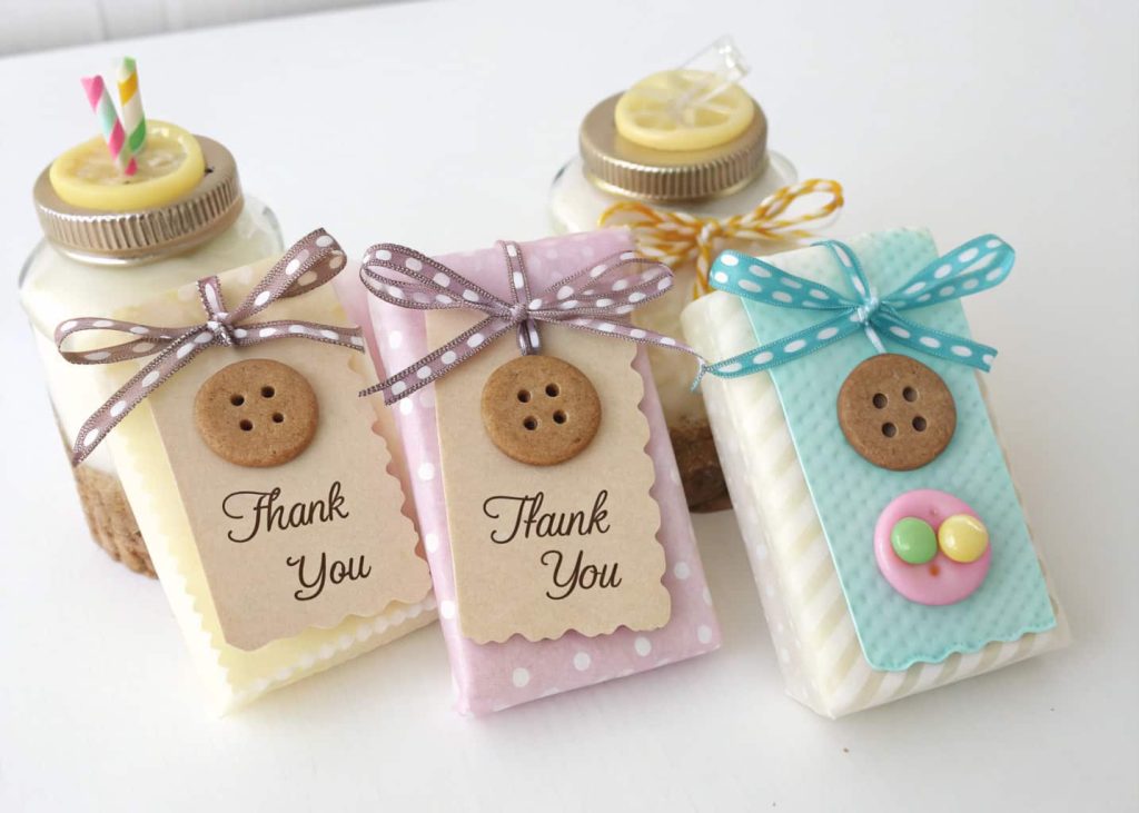 cute homemade baby shower favors with ribbons and thank you tags
