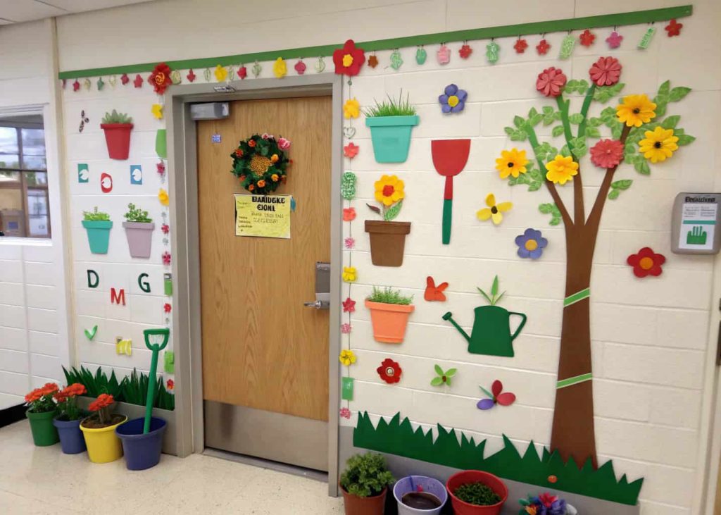 Door decorated with paper garden tools, potted plants, flowers, playful and educational spring theme.