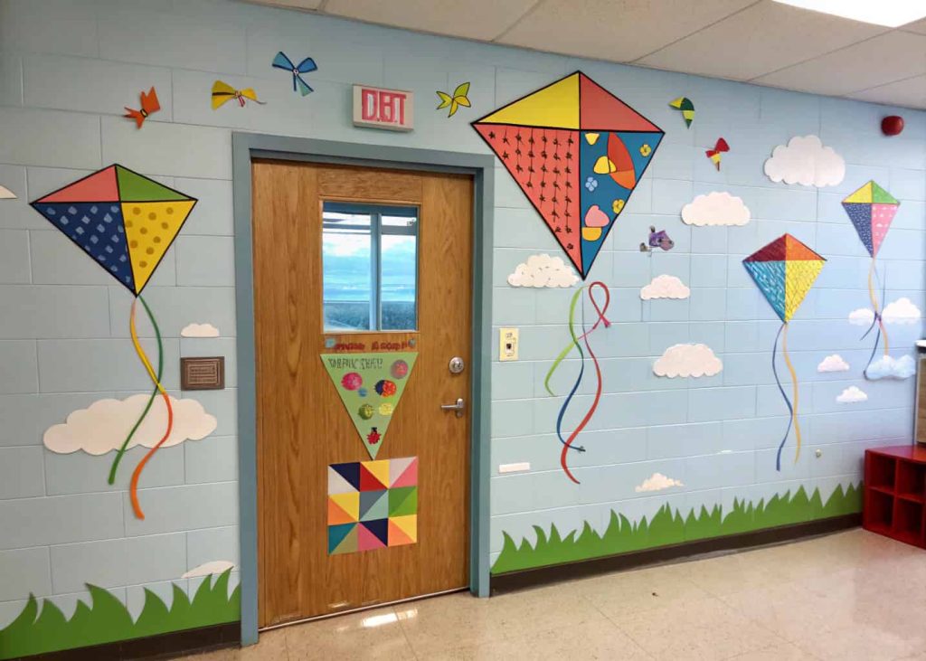 classroom door decorated with colorful kites, bright sky theme, fun and cultural spring vibe