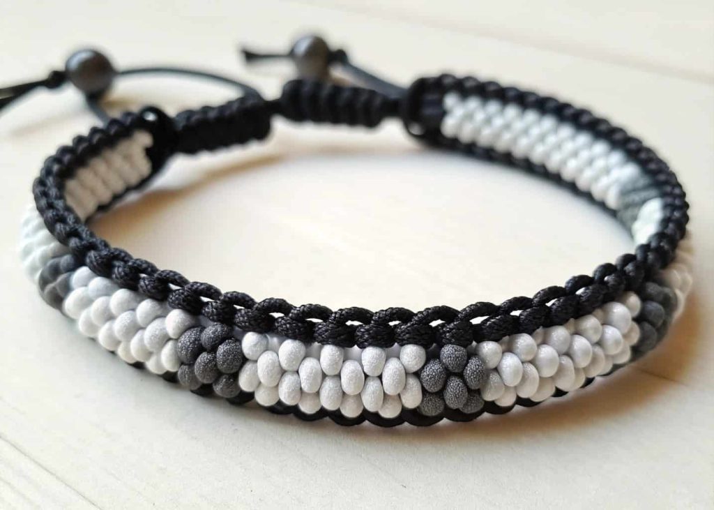 Monochrome pony bead bracelet with macramé knots in black white and gray