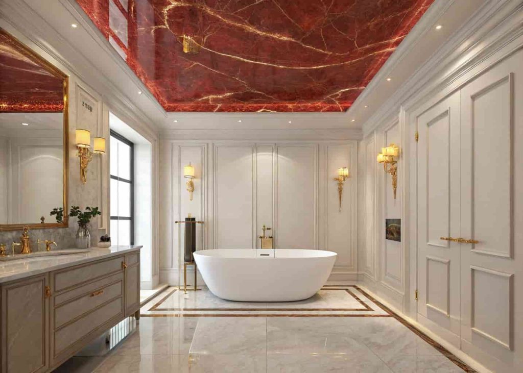 Red marble ceiling above freestanding bathtub creating a dramatic and luxurious spa-like bathroom experience.