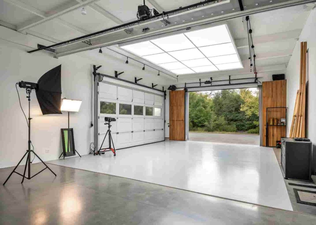 Garage converted into a photography studio with professional lighting and backdrop setup