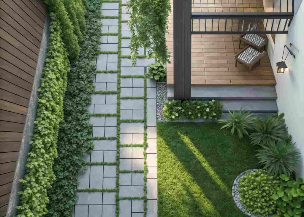 Permeable paver walkway with green creeping plants filling the gaps between concrete pavers in a modern garden setting.