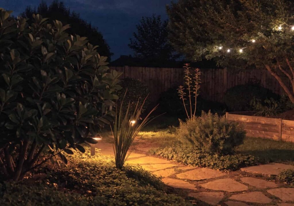 Garden lighting ideas highlighting features of a big backyard