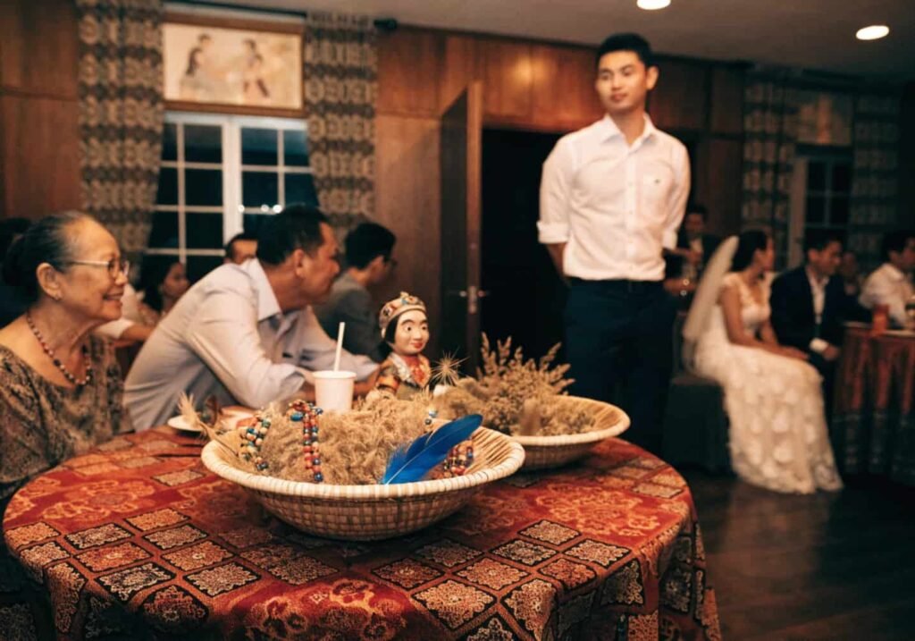 Cultural heritage-inspired wedding reception decor with traditional textiles
