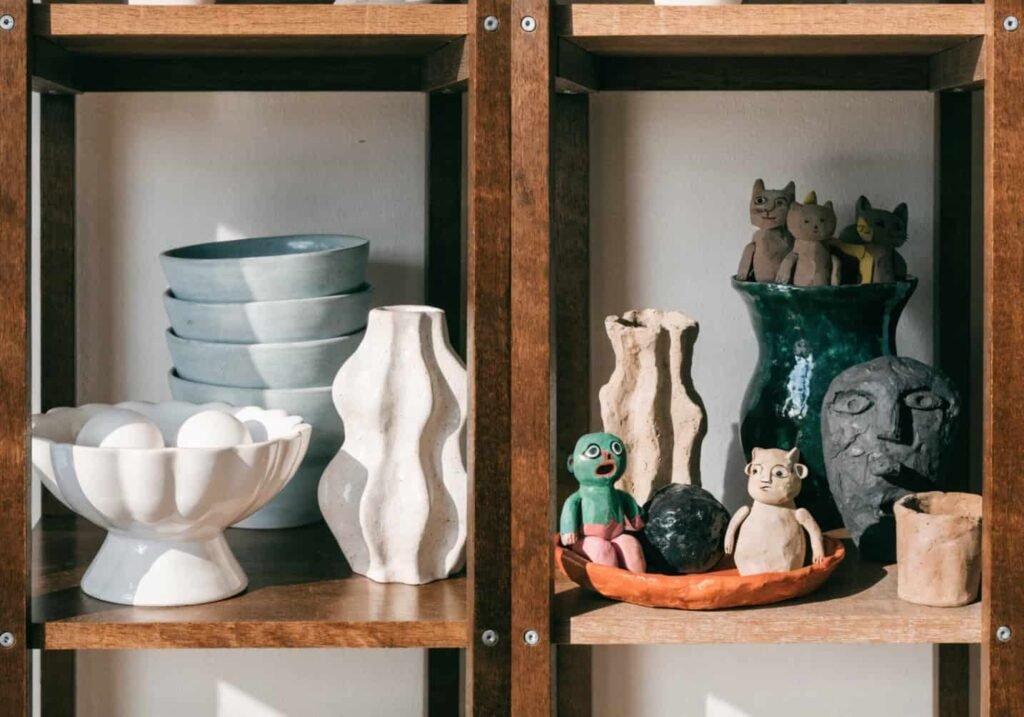 Comparison of store-bought decor versus handmade clay figure decor