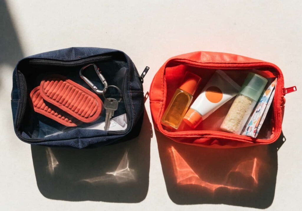 Seasonal travel kit swap showing winter and summer packing items