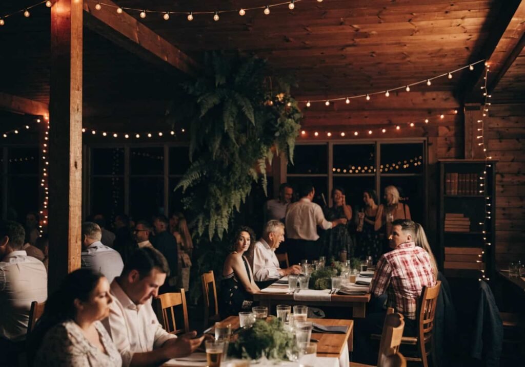 Mountain and forest-inspired wedding reception with wooden decor and warm lighting