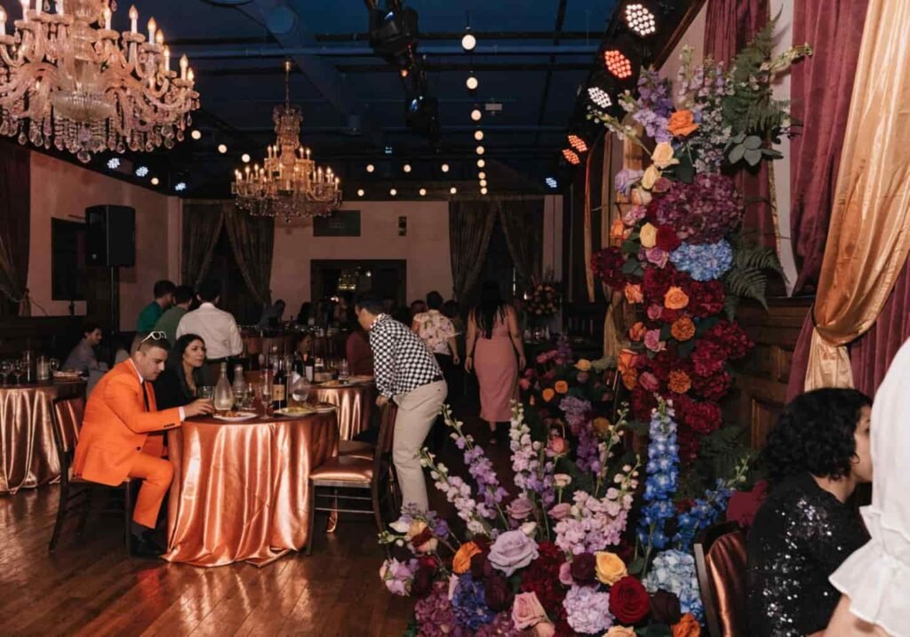 Bold maximalist wedding reception with jewel-tone decor