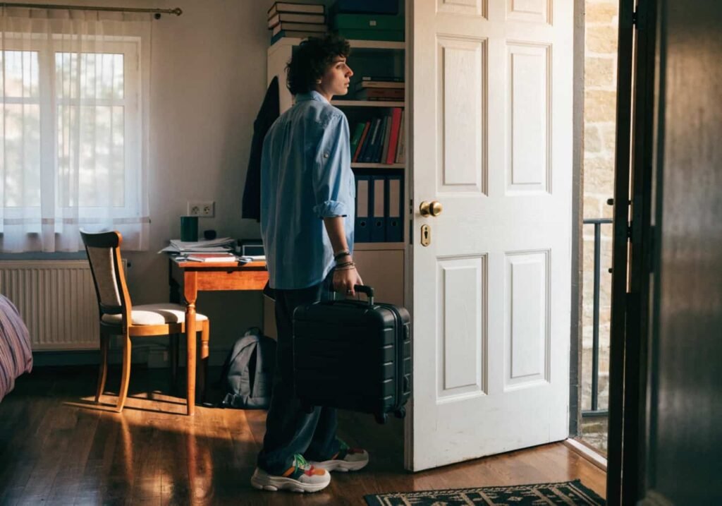 Person doing a final checklist walkthrough before leaving home for a trip.