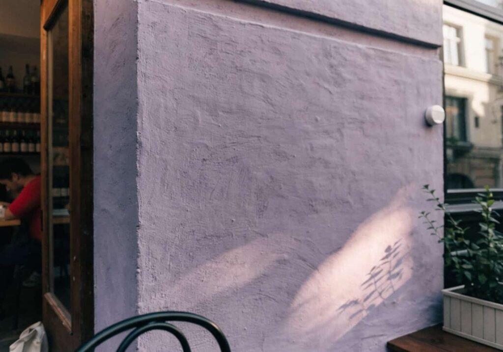 Pastel lavender wall background aesthetic cafe photo spot