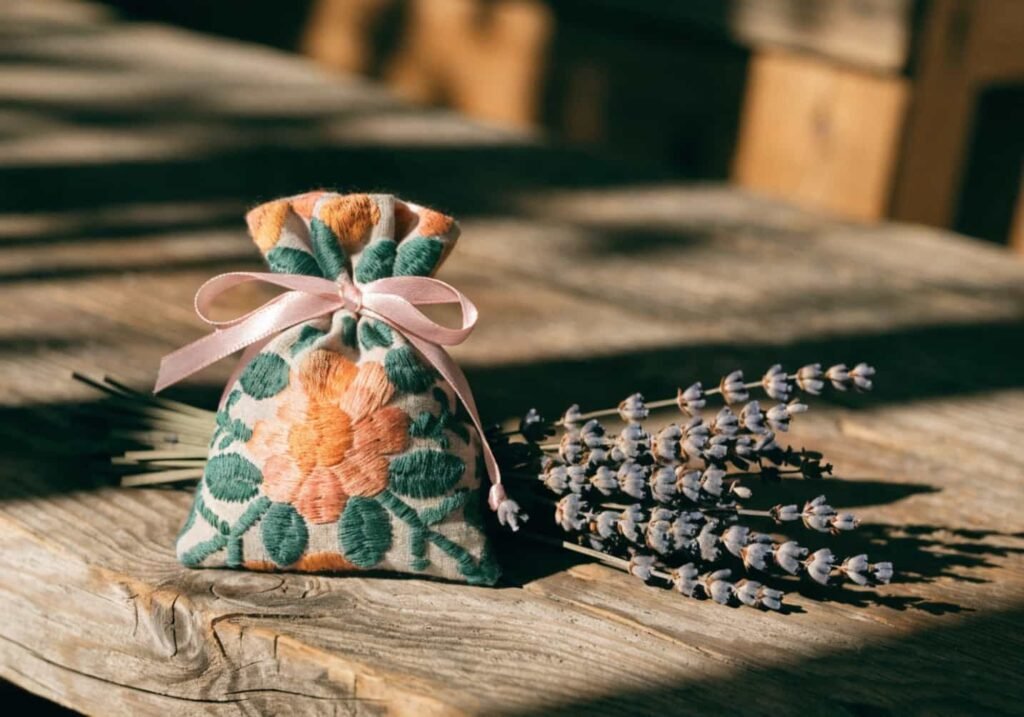 Small embroidered pouch with floral design filled with lavender as a handmade gift
