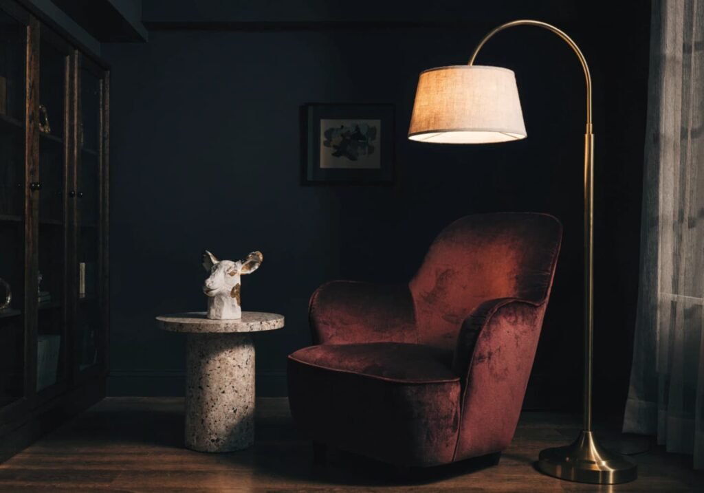 High-end living room look created with a black accent wall