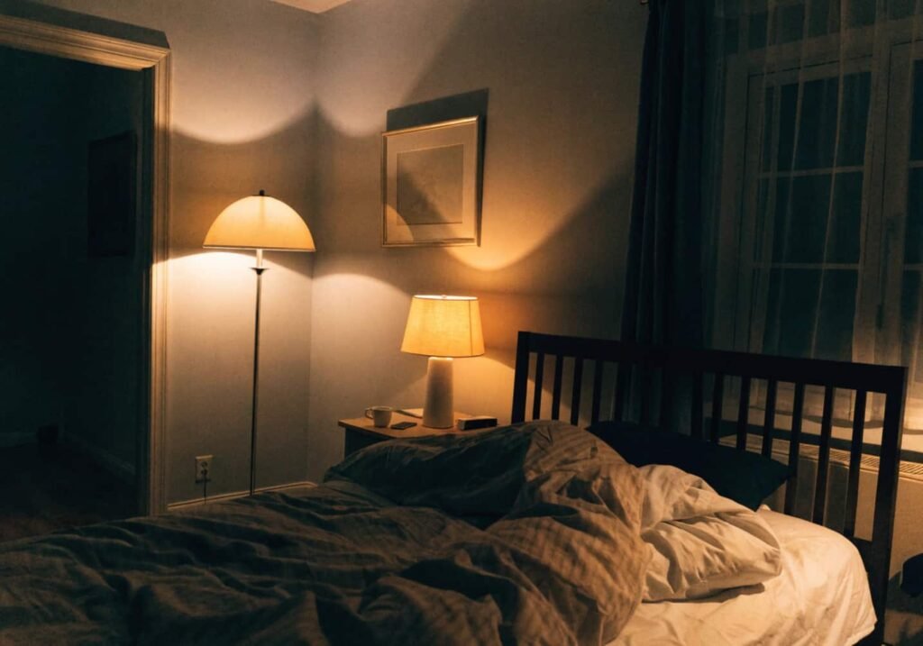 Warm layered lamp lighting in a romantic bedroom at night