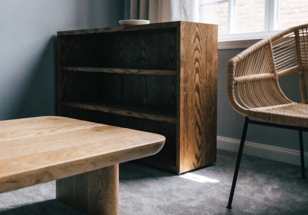 Mixed wood tones warming up a grey boho living room