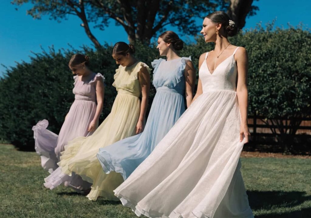 Wedding party wearing lightweight breathable fabrics suited for hot summer weather.