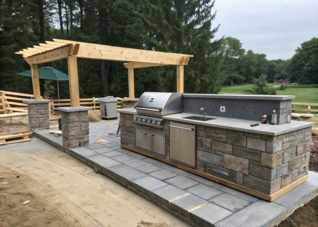 Step by step construction stages of a built-in outdoor grill station