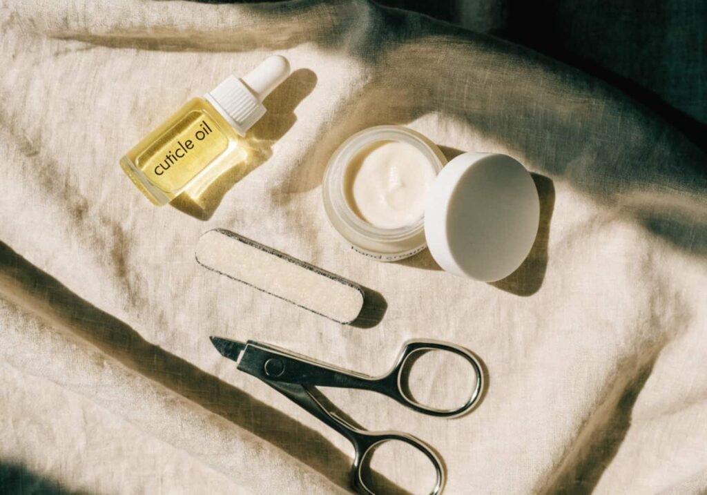 Nail care essentials including cuticle oil and buffer for healthy classy nails