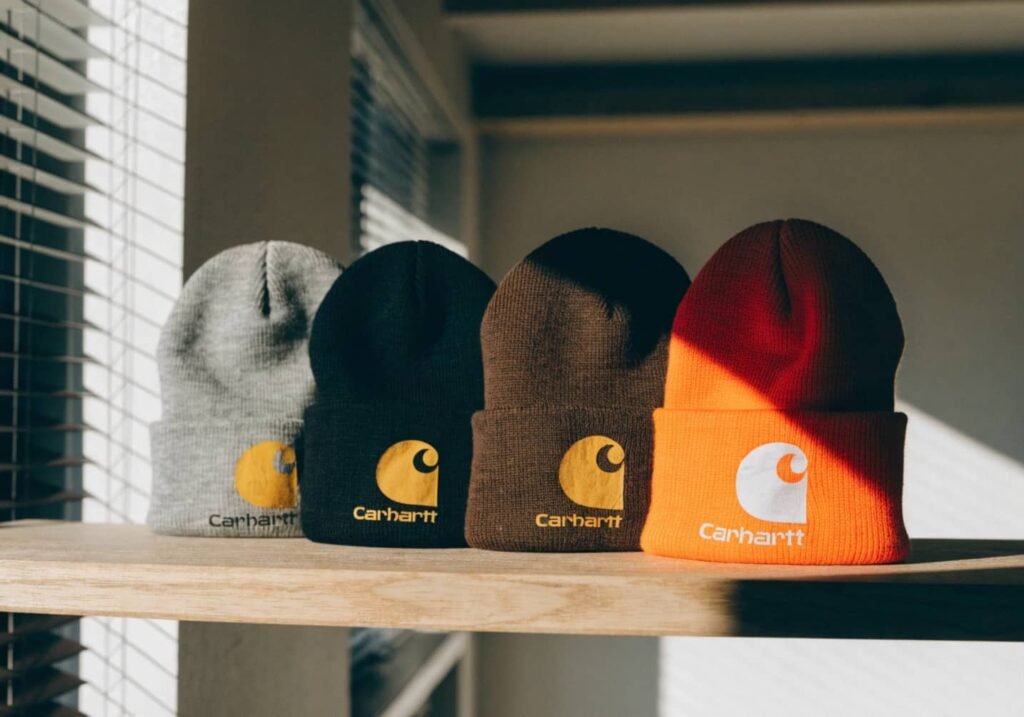 Multiple color options of Carhartt beanies displayed together