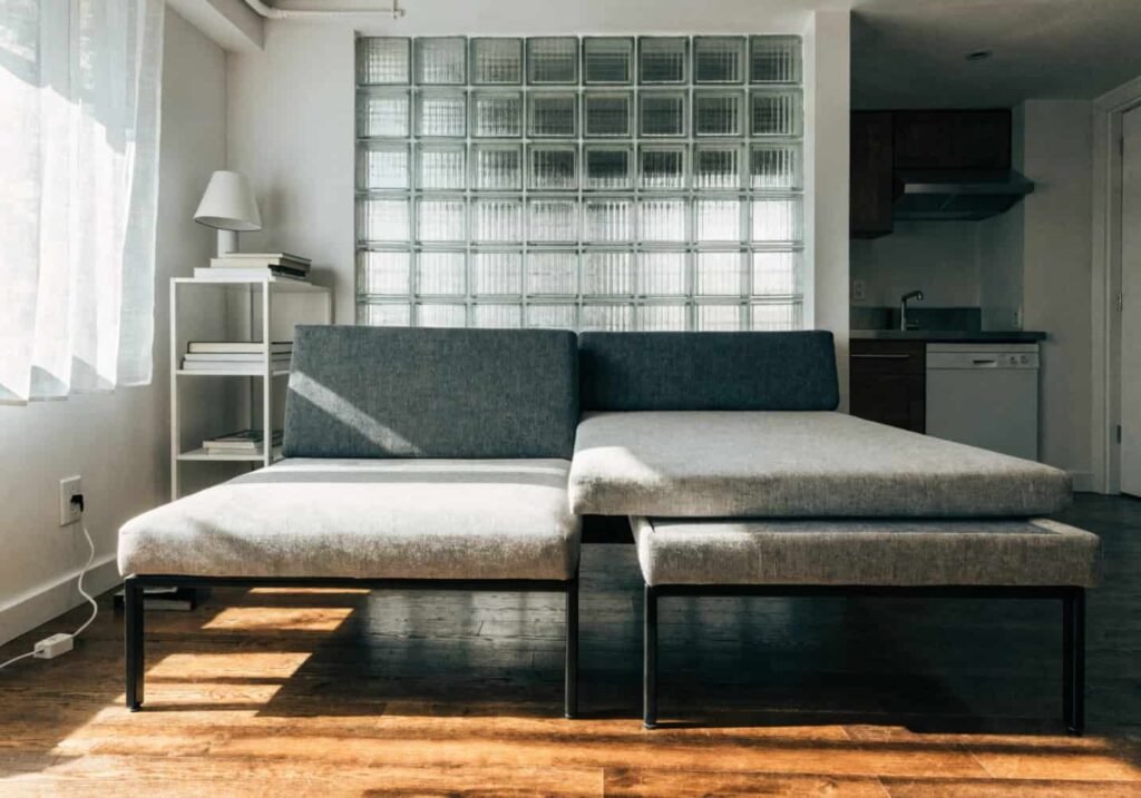 Flexible fold-out and nesting sofa setup designed for studio apartment living.