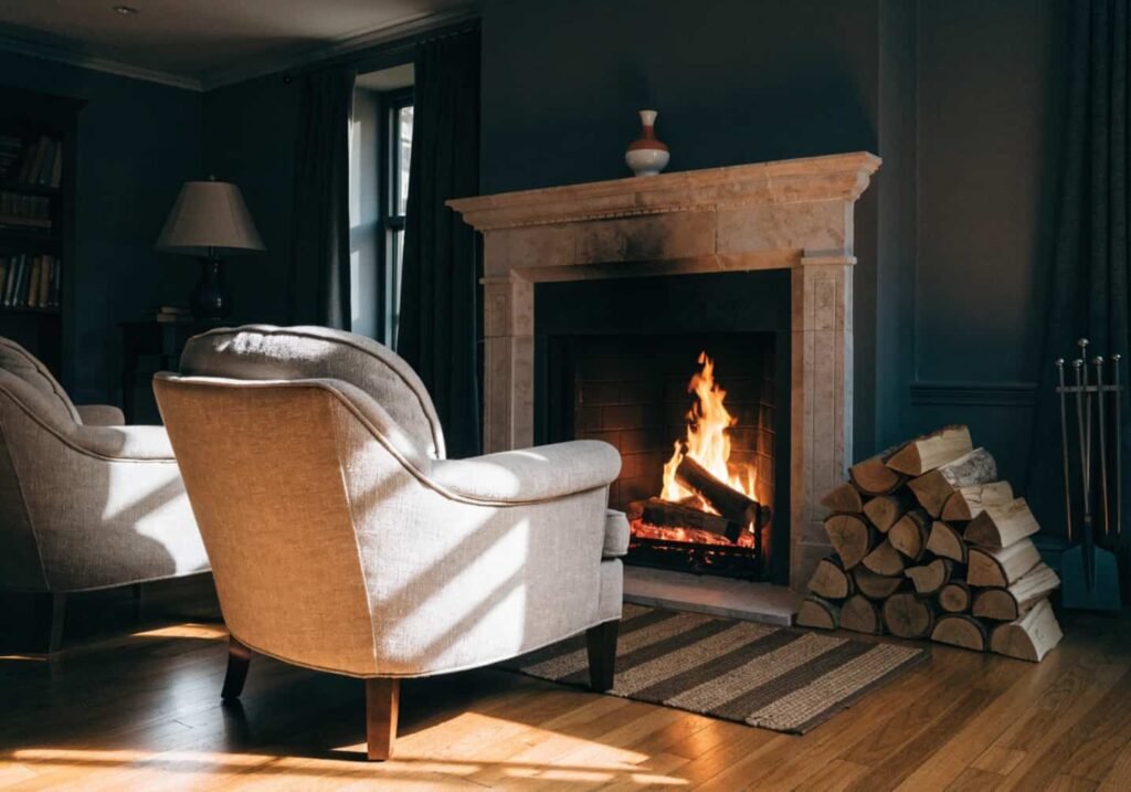 Fireplace area with armchairs angled inward for a cozy gathering spot