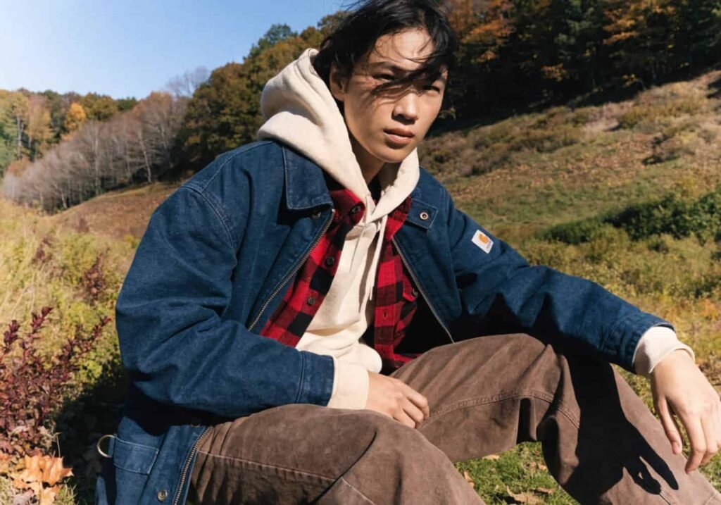 Unisex Carhartt jacket worn by different people showing gender-neutral fit