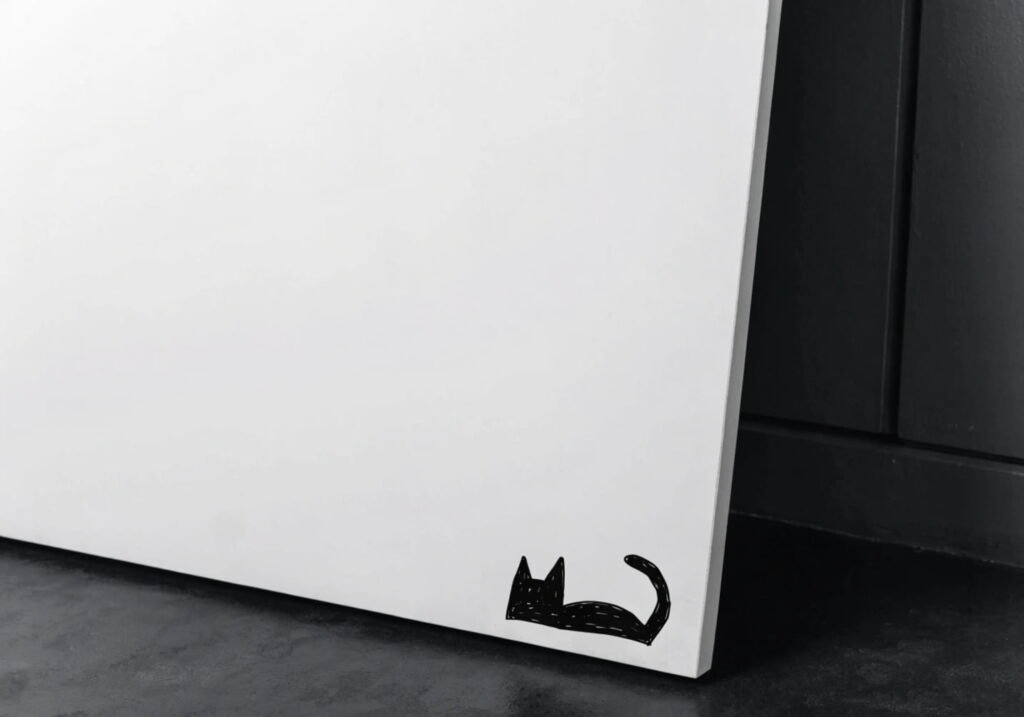 Minimalist white board design featuring one small black cat silhouette in the corner.