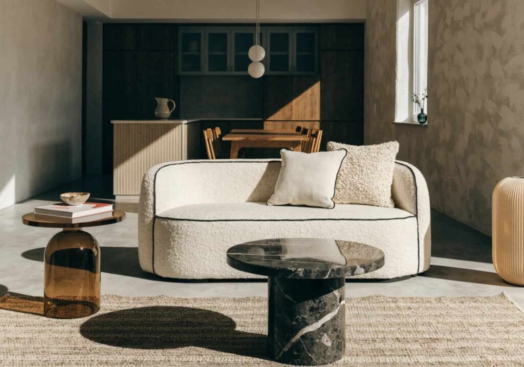 Low-backed sofa defining living space in an open-concept home
