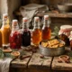 Homemade Christmas food gifts in jars and bottles on a wooden table