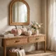 Console table styled with velvet pumpkins and flowers