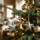 Christmas tree with metal and tin ornaments