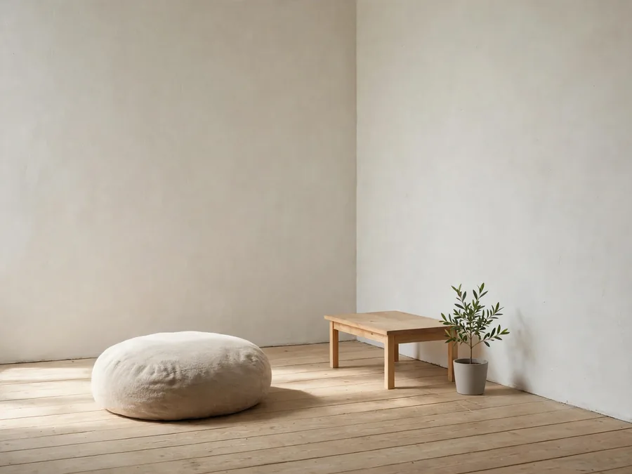 Tiny room with a floor cushion and low table